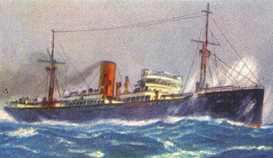 Out at sea, with spray over the bow.