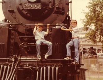 Dave and I in the early 70's on AT&SF 4-8-4 #2903.&nbsp; NYC #999 in background.